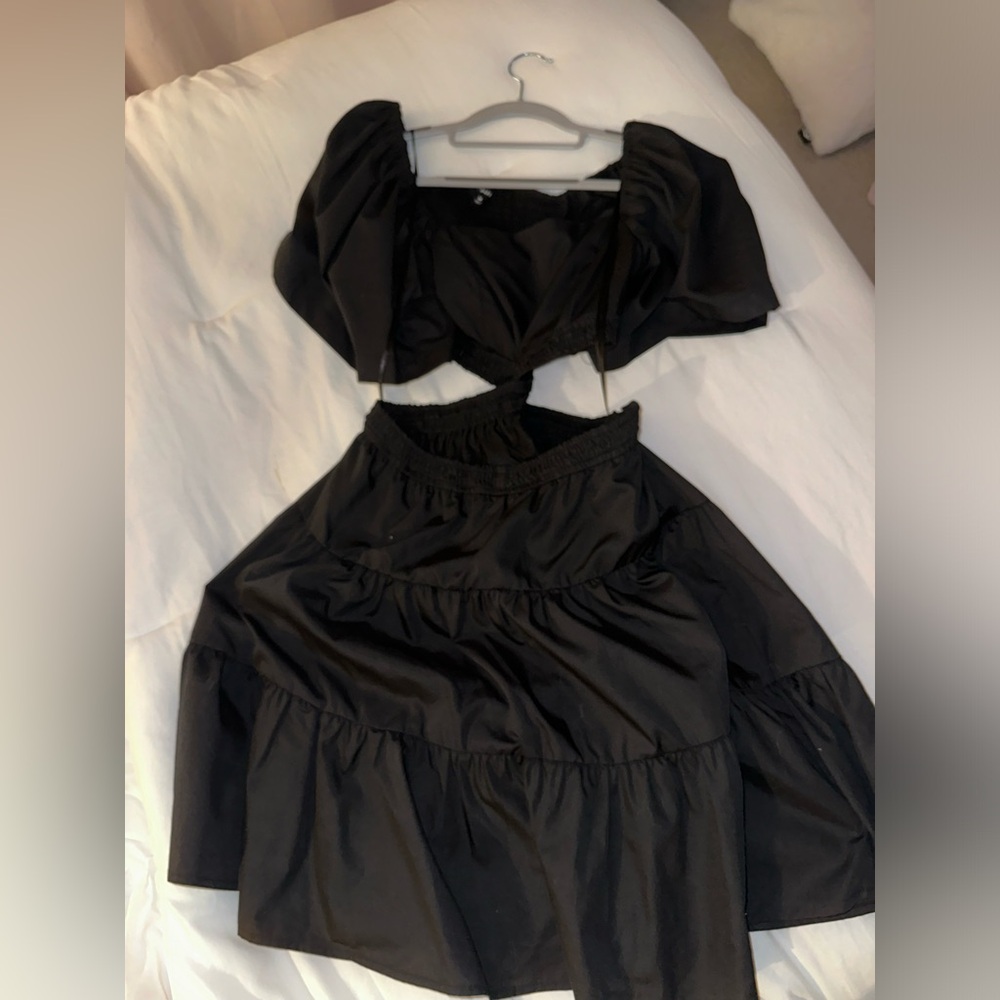 Black windy nest dress with cut outs size medium